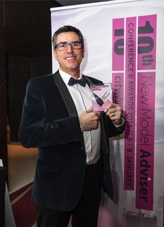 Colin Lawson Holding ward for Equilibrium Asset Management New Model Adviser Awards Firm of the Year