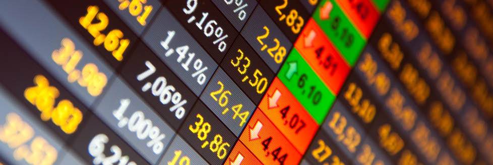 stock market tracker board showing stocks up and down