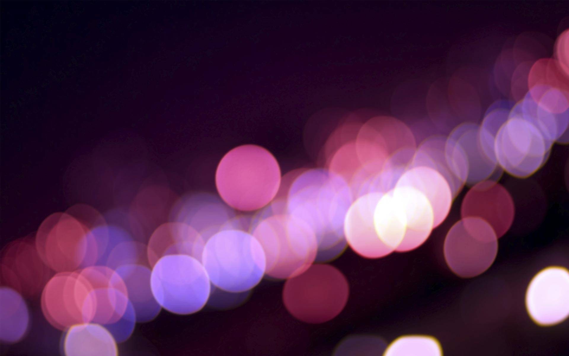 Equilibrium background of blurry pink and purple lights