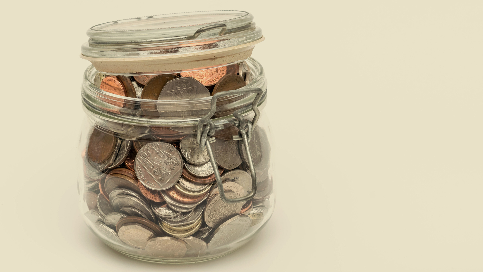 money jar with coins in